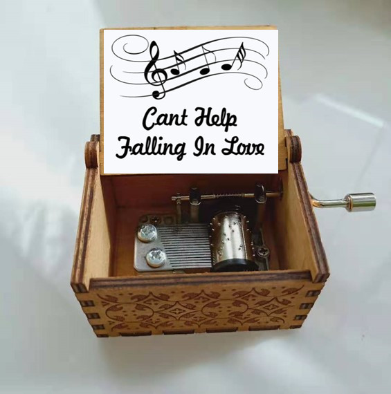 Handcrafted Wooden Music Box with Engraved Landscape Design