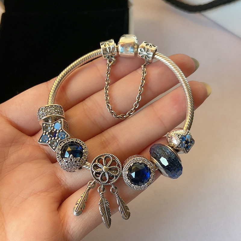 Electroplated Silver Bracelet with Snowflake & Star Designs