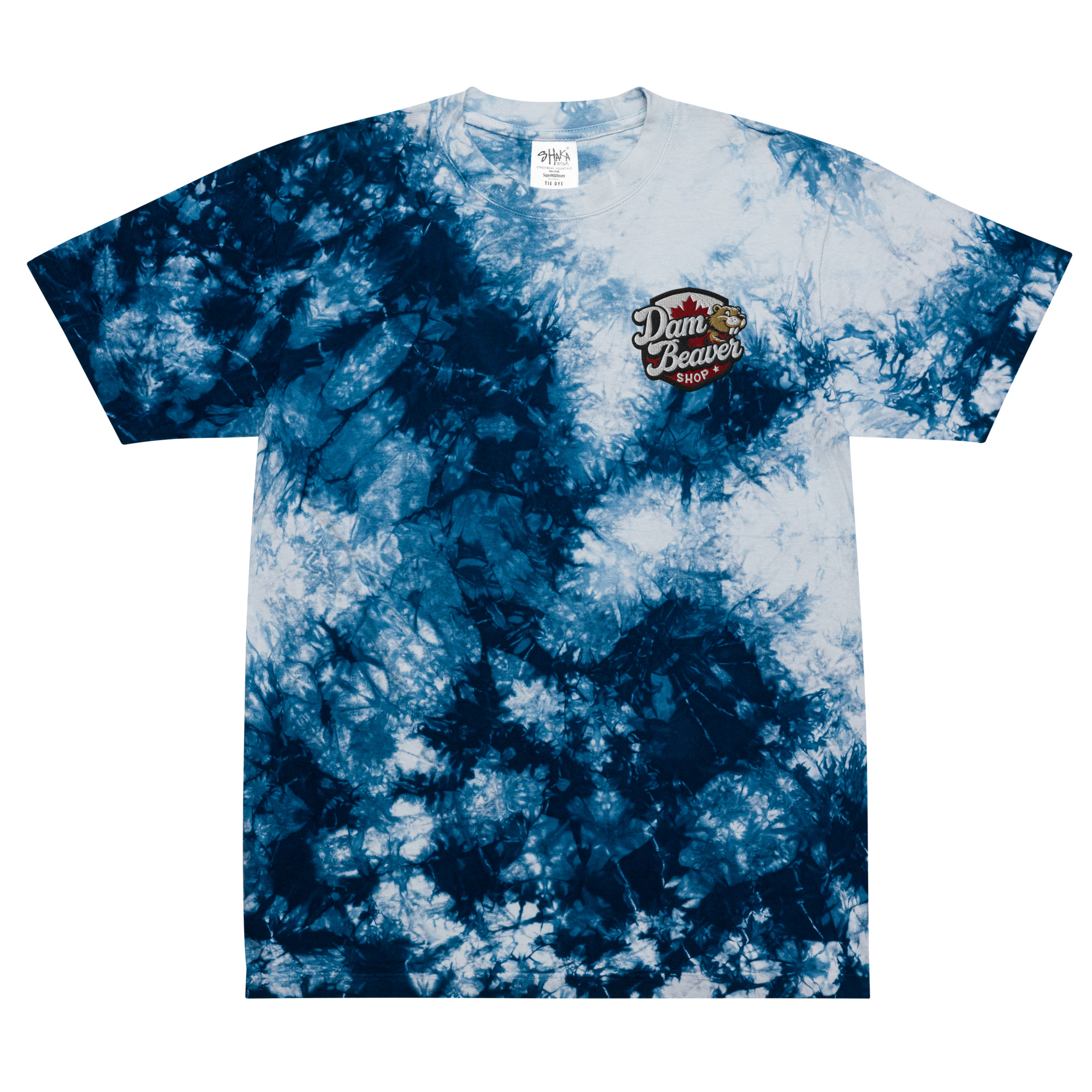 The Oversized Tie-Dye T-Shirt – Trendy & Durable Cotton Streetwear features blue and white tie-dye, short sleeves, and a small Damn Beaver Supply beaver logo on the left chest.